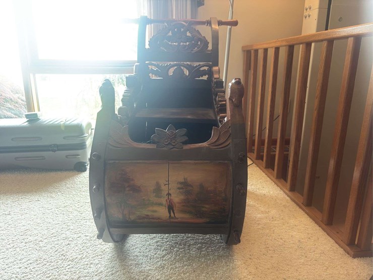 sled-with-ornate-painting-image-4