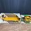 (2)-1/16-john-deere-skid-steer-+-machine-trailer-nib-ertl-image-1