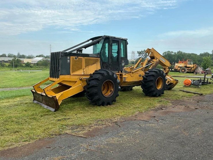 2003-deere-648g-image-1