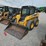2005-john-deere-320-image-1