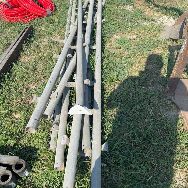 Shed door track with tandem rollers