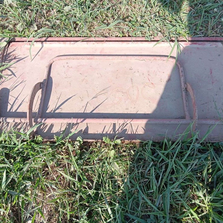 Slide gate for grain bed