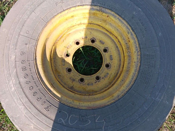 1-10.00x16-tire-and-rim-off-jd-4440,-rim-is-partially-bent-image-1