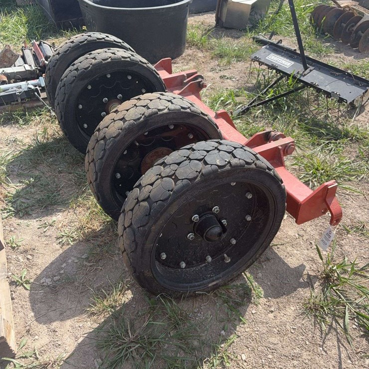Bush Hog brand tires with framework.