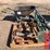 pallet-of-pipe-wrenches,-jumper-cables,-wheel-dolly-and-wheelbarrow-image-1