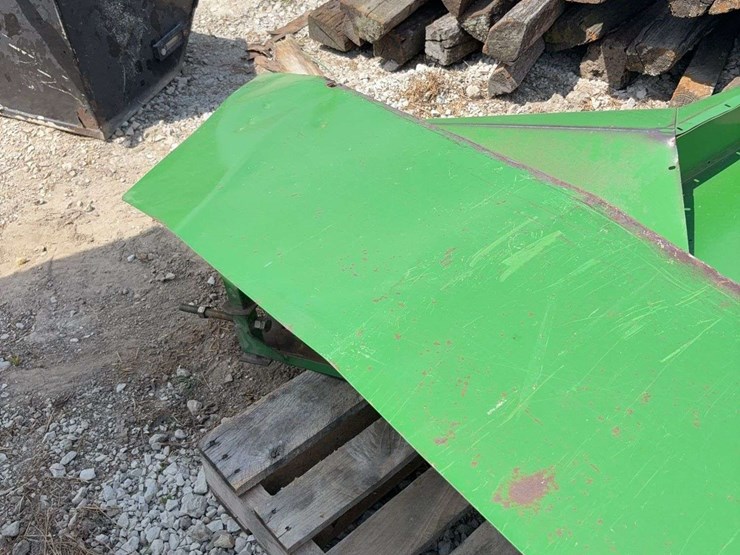 set-of-crop-dividers-off-of-a-john-deere-900-series-platform-image-5
