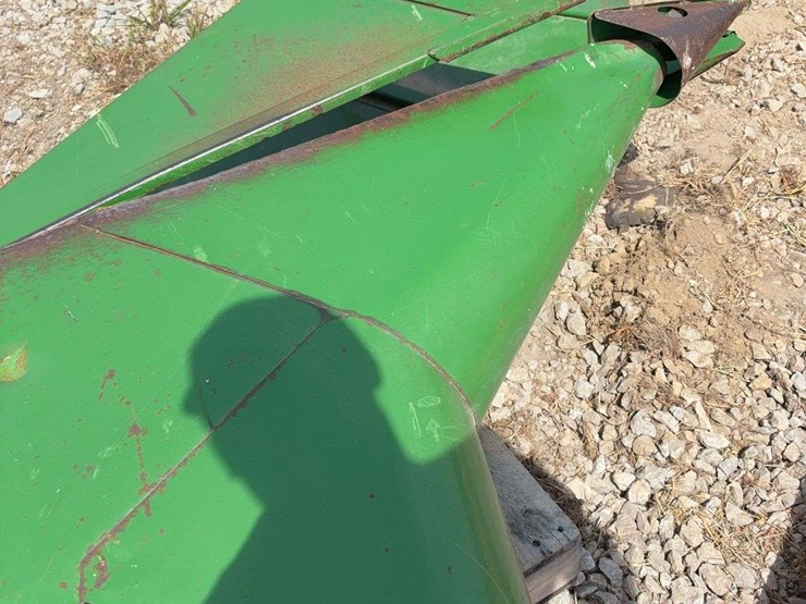 set-of-crop-dividers-off-of-a-john-deere-900-series-platform-image-6