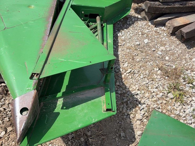 set-of-crop-dividers-off-of-a-john-deere-900-series-platform-image-2