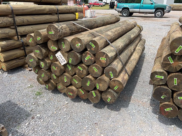 qty-(35)-unused-6-7"x8'-tapered-pressure-treated-posts-image-1