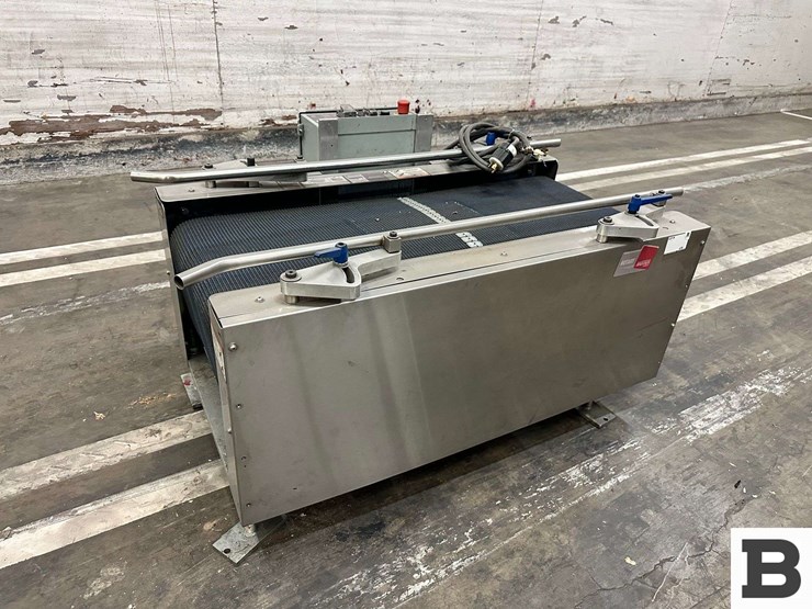 wexxar-packaging-case-settling-conveyor--syracuse,-ut-image-1