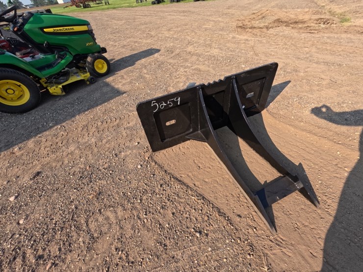 #5259-•-skid-steer-rock-digger-image-1