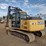 2010-deere-120d-image-51