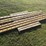 (6)-8’-used-grader-blades,-off-of-cat,-(b)-image-2