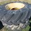 pair-of-16.9-30-jd-front-wheel-assist-tires-on-rims-image-1