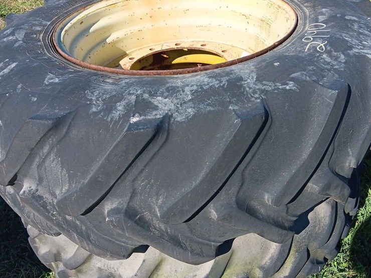 pair-of-16.9-30-jd-front-wheel-assist-tires-on-rims-image-1