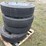 (4)-11r22.5-truck-tires-on-rim-clamp-rims,-used,-buying-all-for-one-money-image-1