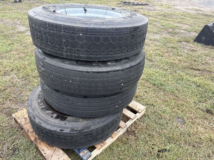 (4)-11r22.5-truck-tires-on-rim-clamp-rims,-used,-buying-all-for-one-money-image-1