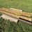 (6)-8’-used-grader-blades,-off-of-cat,-(b)-image-4