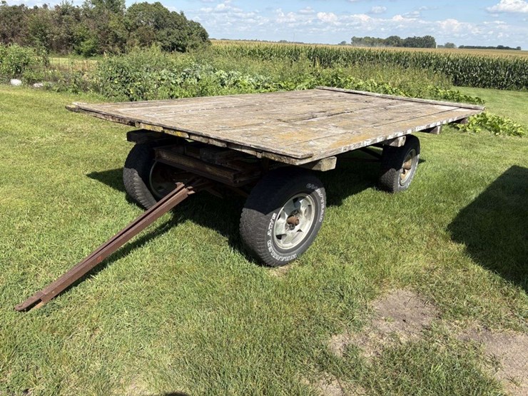 flat-hay-rack,-94”x13.5’,-2”-wood-deck,-on-4-wheel-gear,-16”-tires,-hoist-image-1