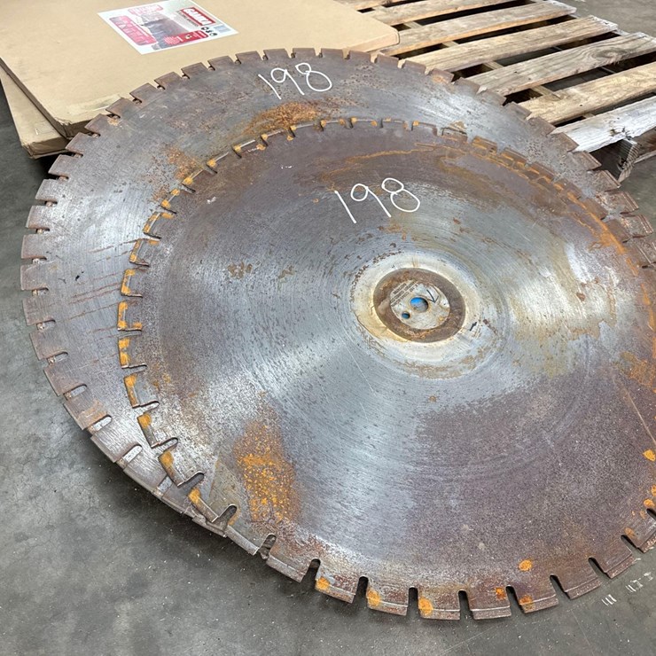 (3) USED 36IN. SAW BLADES & (1) USED 30IN. SAW BLADE SUPPORT EQUIPMENT