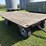 flat-hay-rack,-94”x13.5’,-2”-wood-deck,-on-4-wheel-gear,-16”-tires,-hoist-image-3