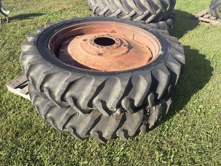 (2)-11.2-38-tires-on-9-bolt-rims-image-1
