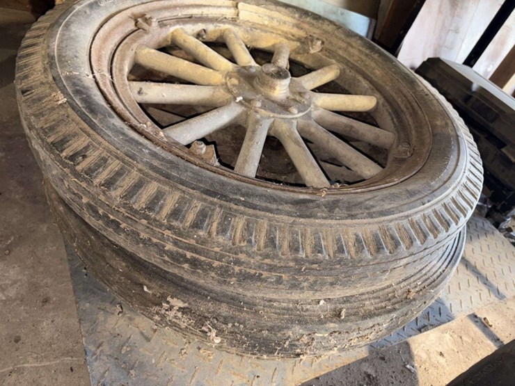 old-car-parts-including:-3-wheels-on-wood-spokes,-36x6-tire,-headlights,-windshield-image-3
