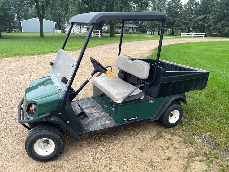 #174-•-2014-cushman-hauler-1200-gas-golf-cart-with-dump-box-image-1