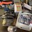pallet-of:-portable-toilet,-(unused),-miter-saw,-caulk,-belt-sander,-and-more,-buying-all-for-one-mo-image-1