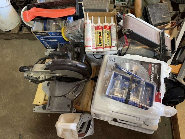 pallet-of:-portable-toilet,-(unused),-miter-saw,-caulk,-belt-sander,-and-more,-buying-all-for-one-mo-image-1