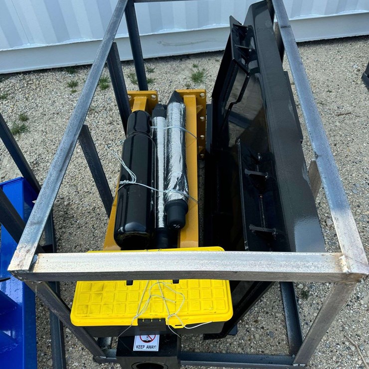 Hydraulic Post Driver Attachment in Custom Cage