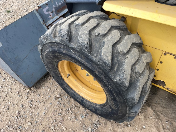 #2058-•-new-holland-l5180-skid-loader-image-15