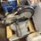 pallet-of:-portable-toilet,-(unused),-miter-saw,-caulk,-belt-sander,-and-more,-buying-all-for-one-mo-image-2