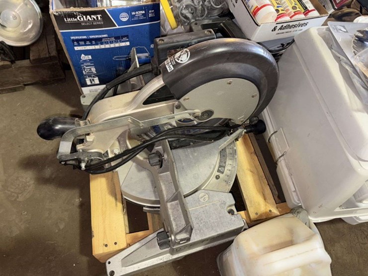 pallet-of:-portable-toilet,-(unused),-miter-saw,-caulk,-belt-sander,-and-more,-buying-all-for-one-mo-image-2