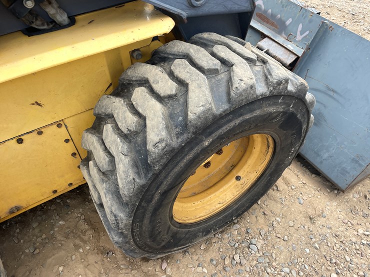#2058-•-new-holland-l5180-skid-loader-image-19