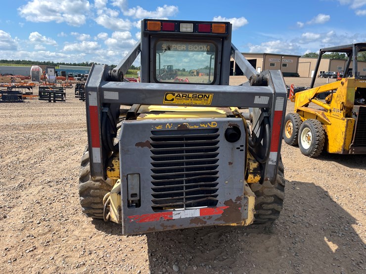 #2058-•-new-holland-l5180-skid-loader-image-4