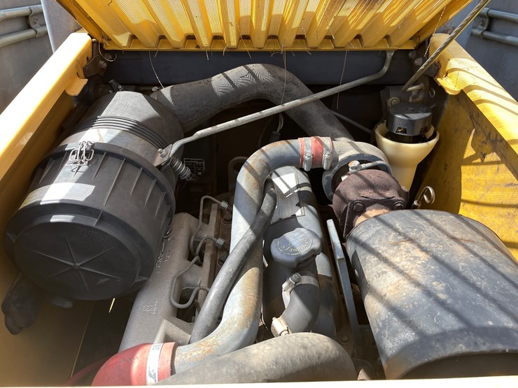 #2058-•-new-holland-l5180-skid-loader-image-13