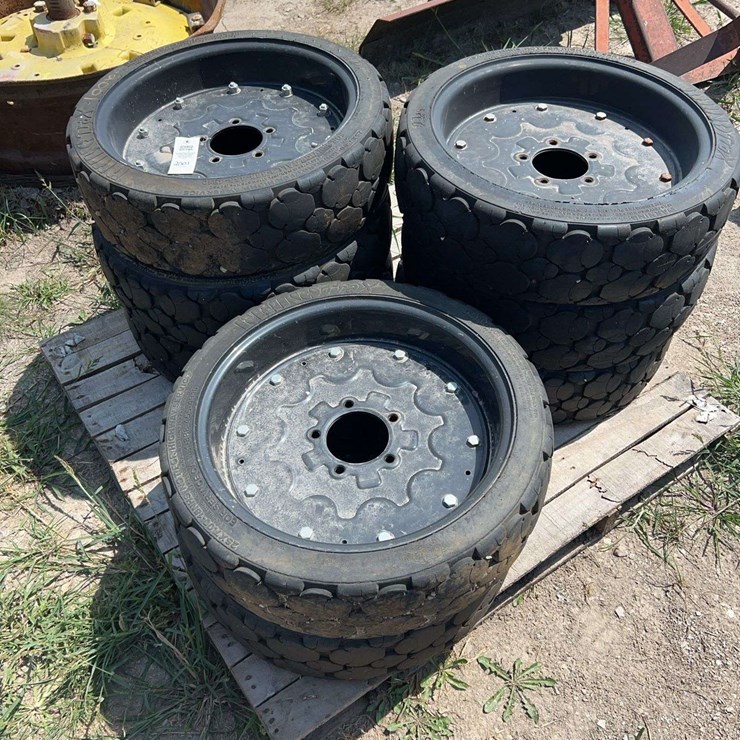 Pallet of Bush Hog brand rims and tires (Quantity 8 one money bid like new)