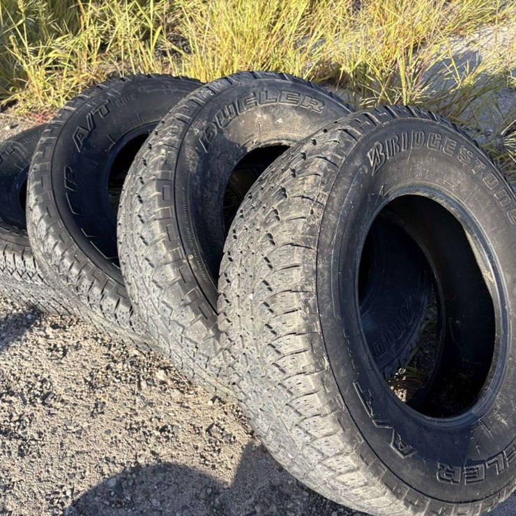 (4) Bridgestone Dueler A/T Tires, 265/70R17