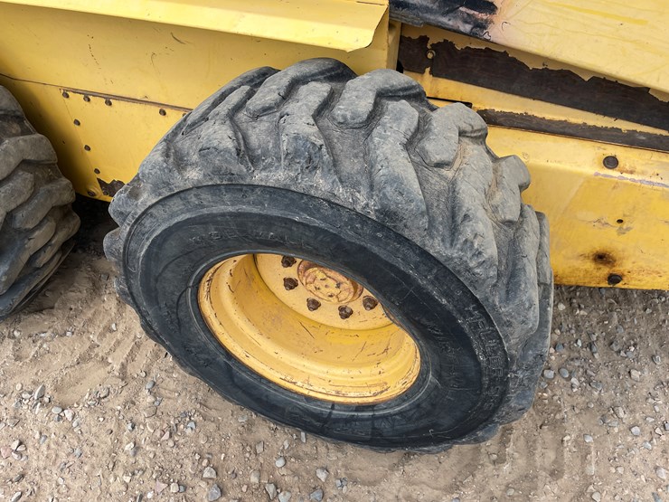 #2058-•-new-holland-l5180-skid-loader-image-16