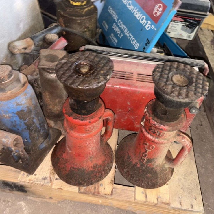 Pallet of: Hyd Bottle Jacks, Screw Jacks, Jig Saw, Solder Gun, 4” Angle Grinder, Air Nailer, pry bar