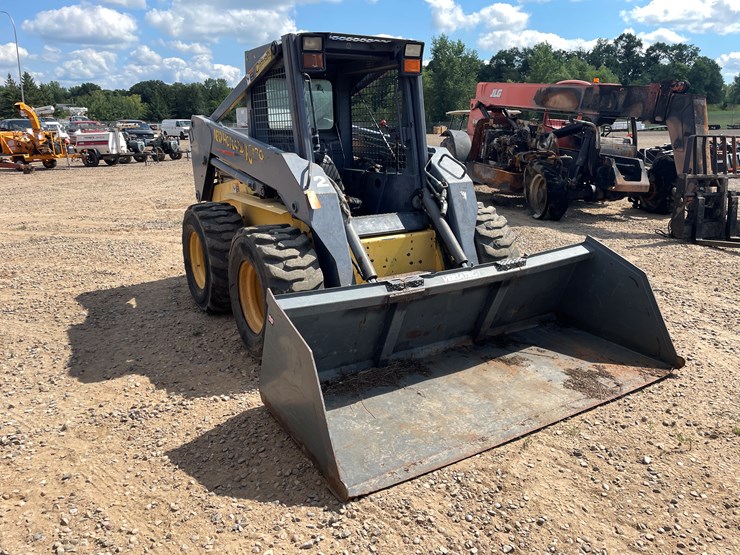 #2058-•-new-holland-l5180-skid-loader-image-7