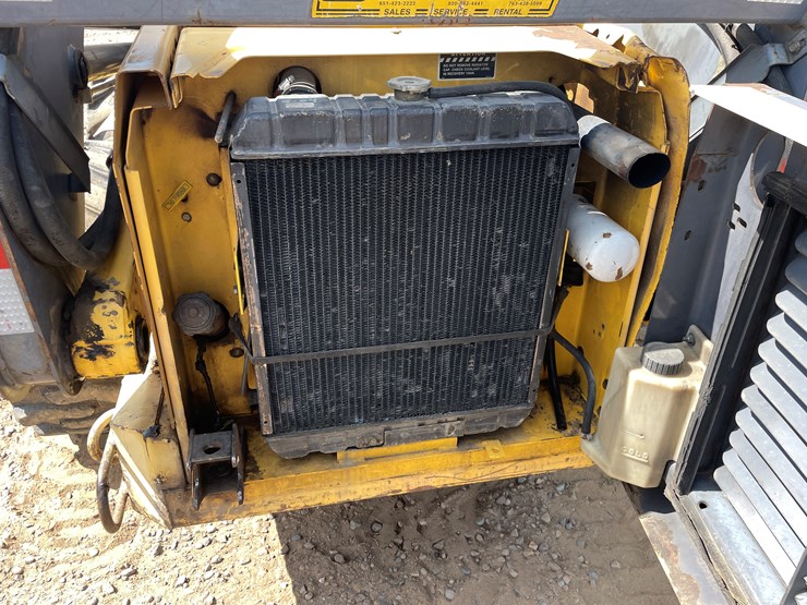 #2058-•-new-holland-l5180-skid-loader-image-14