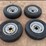 #15997-•-set-of-(4)-tires-on-steel-rims-image-1