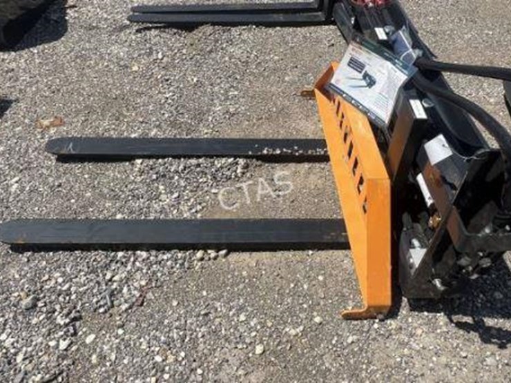 #31-•-wolverine-hydraulic-adjustable-skid-steer-forks-image-1