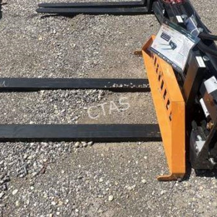 #31 • Wolverine Hydraulic Adjustable Skid Steer Forks