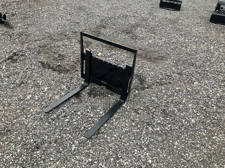 #1552-•-unused-mini-skid-steer-forks-image-1