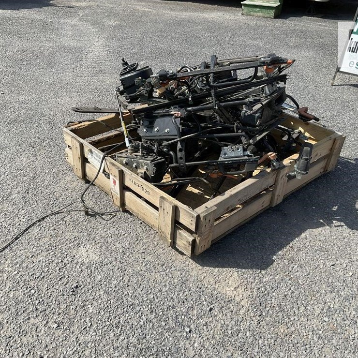 PALLET OF BOBCAT DOOR PARTS