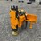 #1411-•-unused-skid-steer-post-pounder-image-1
