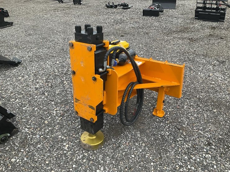 #1411-•-unused-skid-steer-post-pounder-image-1